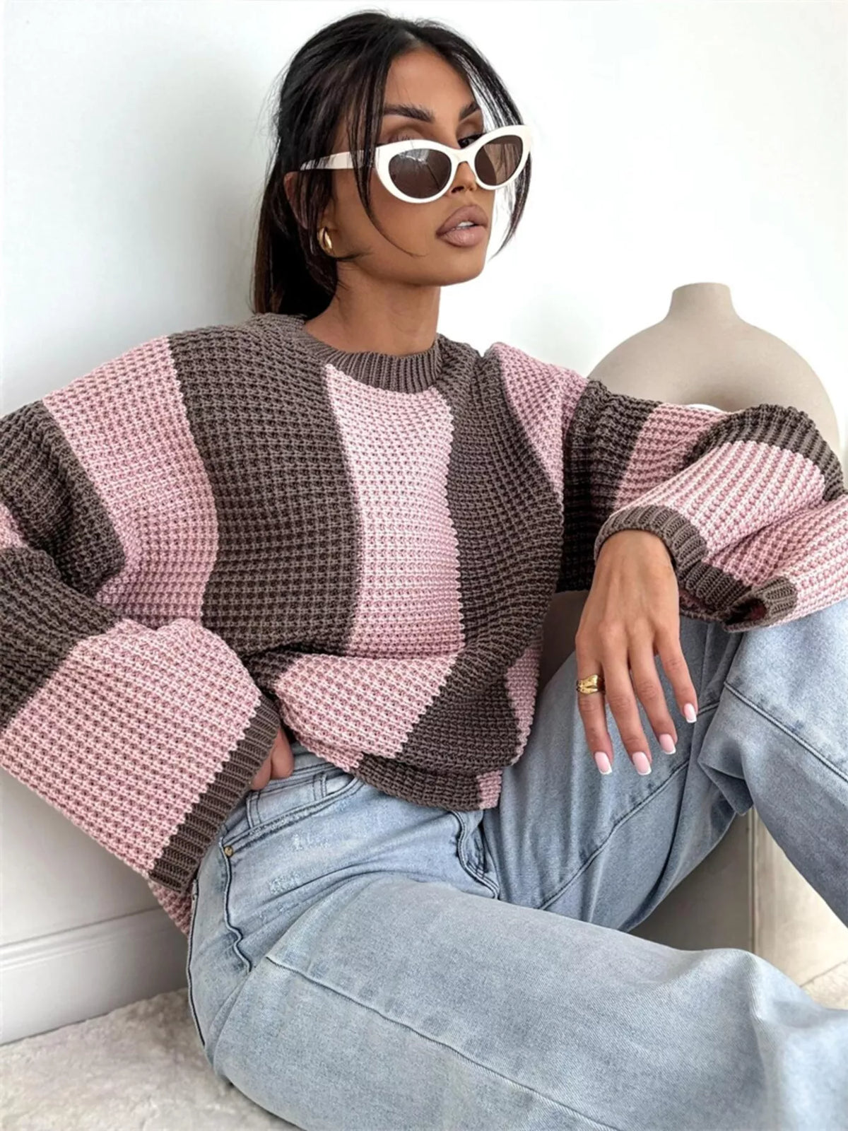 Color block long sleeve sweater from Trendsi featuring bold color panels and a cozy knit design.