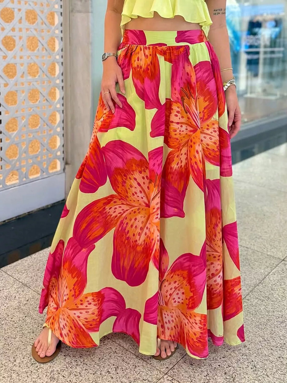 Women's lightweight boho floral print flowy maxi skirt with pockets by Plush Fashion Hub, featuring a relaxed fit and vibrant floral design.