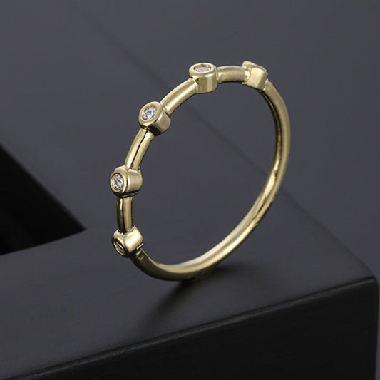 Gold Ring Zirconium Diamond Wedding Style Minimalist TailElevate your style with our Gold Ring Zirconium Diamond. Crafted with quality copper and electroplated with 14K gold, this European and American style ring features EaringsPlush Fashions ShopPlush Fashion Shop