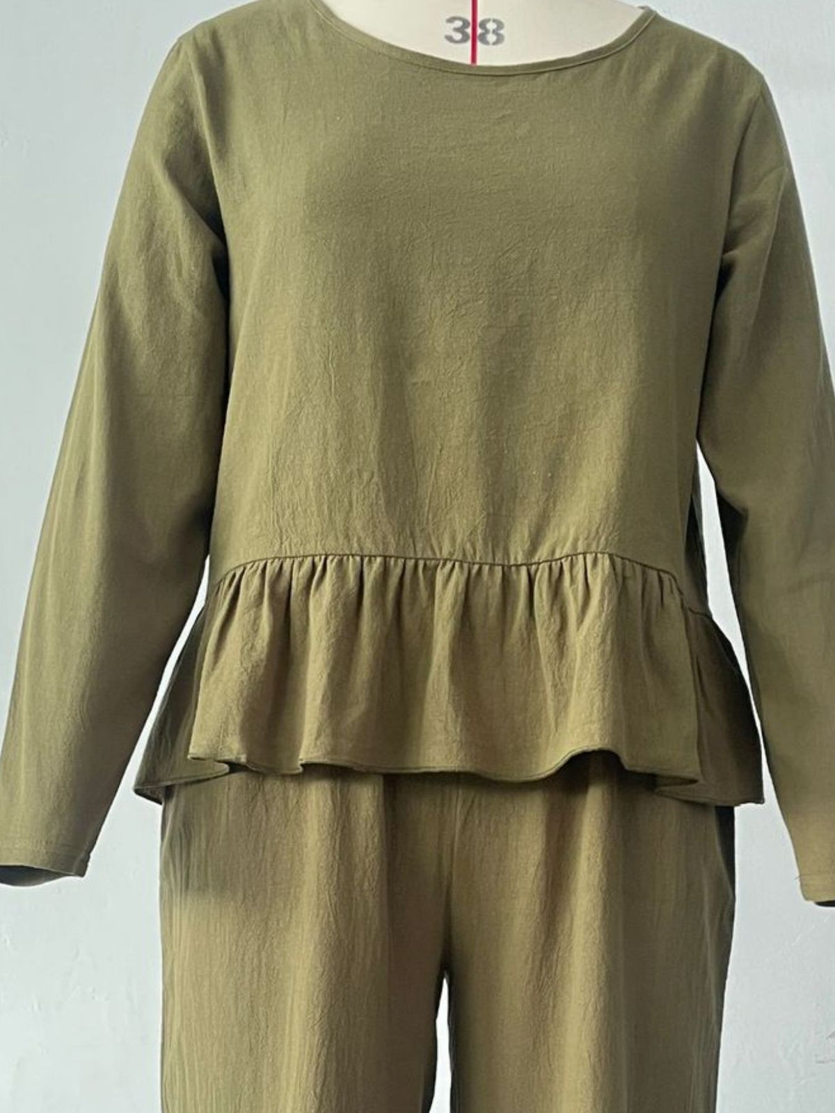 Plush Fashion Hub women's long sleeve ruffled hem top and pants lounge set with pockets, soft and stylish for casual wear.