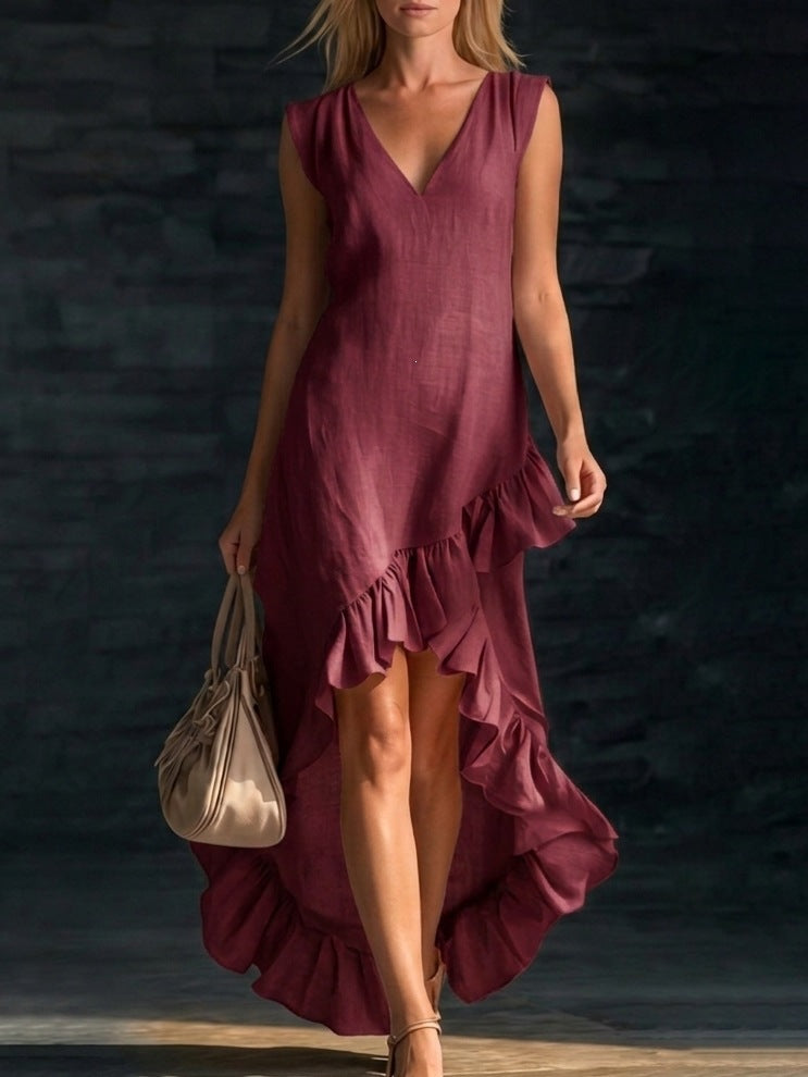 Women's sleeveless V-neck ruffle hem maxi dress in cotton linen, casualwear by FitiqueFit, shown flowing on model.