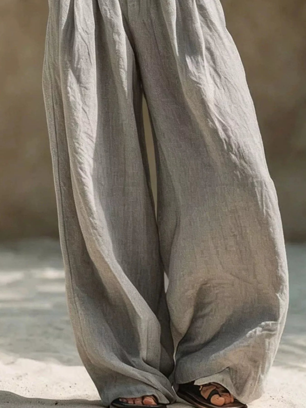 Plus size wide-leg pants with full elastic waistband, casual style, in a relaxed fit, from Trendsi.