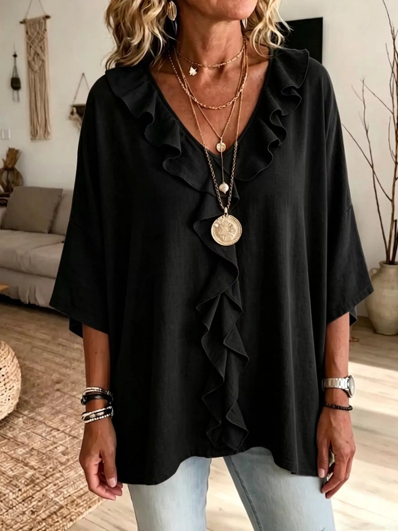 Plus size ruffle V-neck blouse with 3/4 sleeves from Trendsi, featuring a stylish design and flowy fabric.