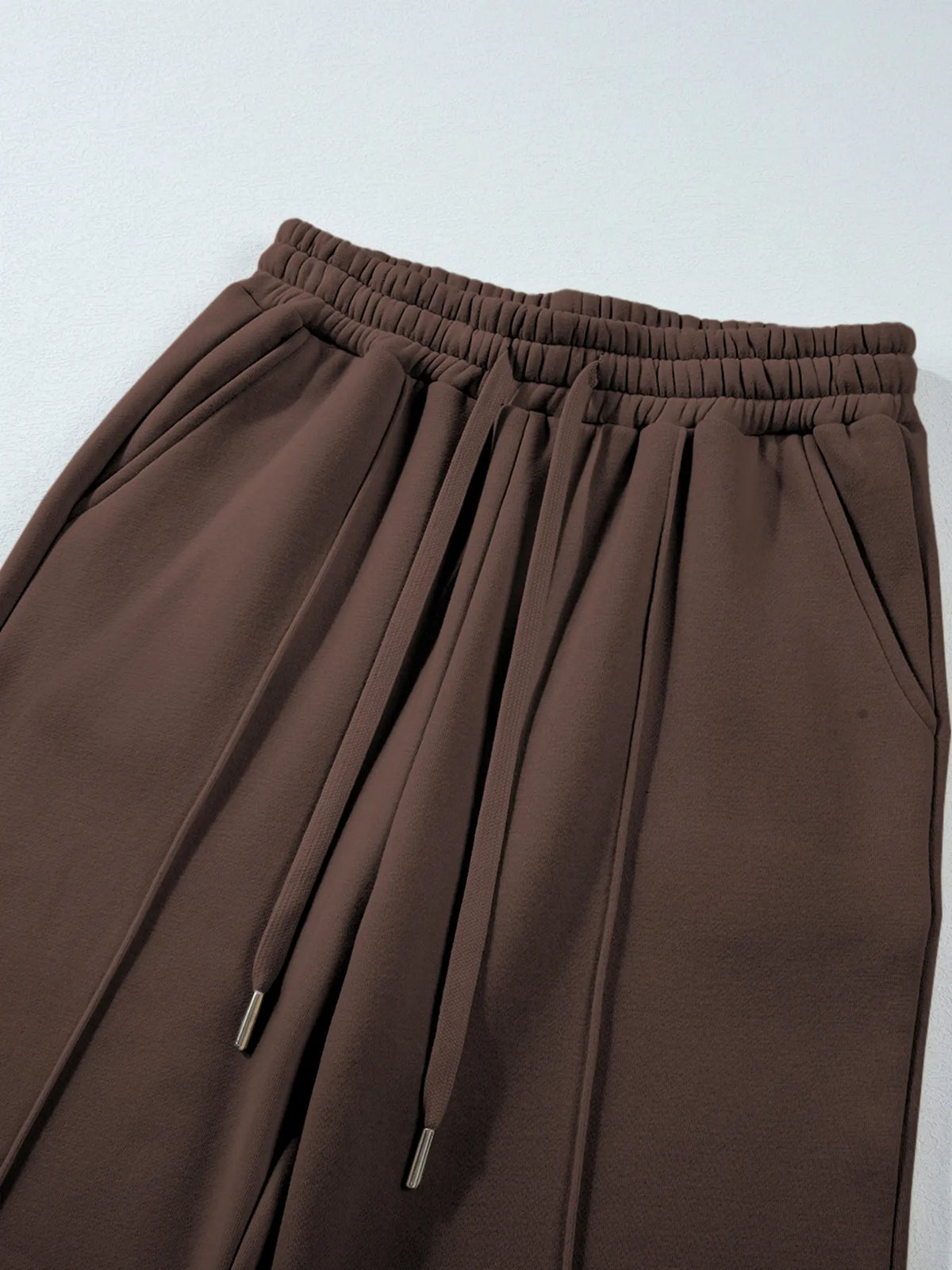 Plush Fashion Hub activewear set with a collared sweatshirt and high waist pants, stylish and comfortable athletic clothing.