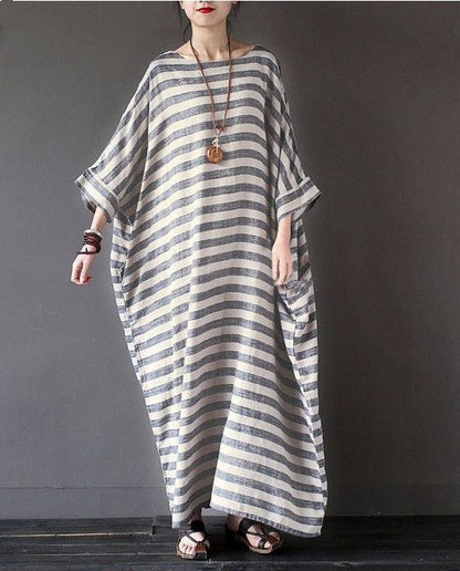 Cotton And Linen Stripes Loose Plus Long DressWrap yourself in effortless style with our Cotton And Linen Stripes Loose Plus Long Dress! Made with high-quality cotton and linen, this dress offers a loose and comDressPlush Fashions ShopPlush Fashion Shop