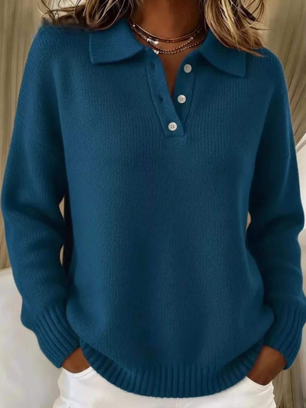 Plus size Trendsi sweater with button details and dropped shoulder design, showing the cozy, oversized fit and knit texture.