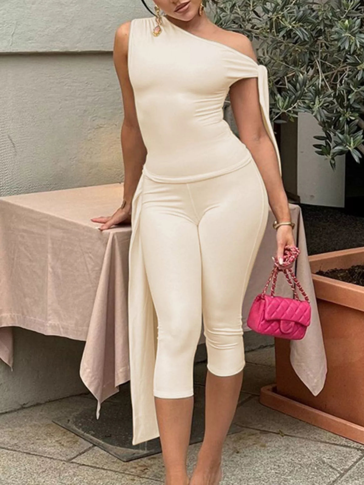 Asymmetrical one-shoulder top and matching capris set from Plush Fashion Hub, featuring stylish cut and comfortable fit.