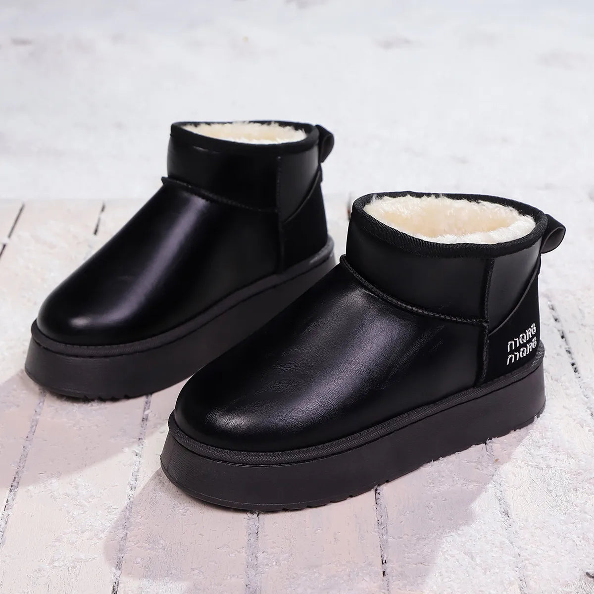 Faux-fur platform ankle boots from Trendsi, stylish shoes with chunky heels and cozy fur detailing.