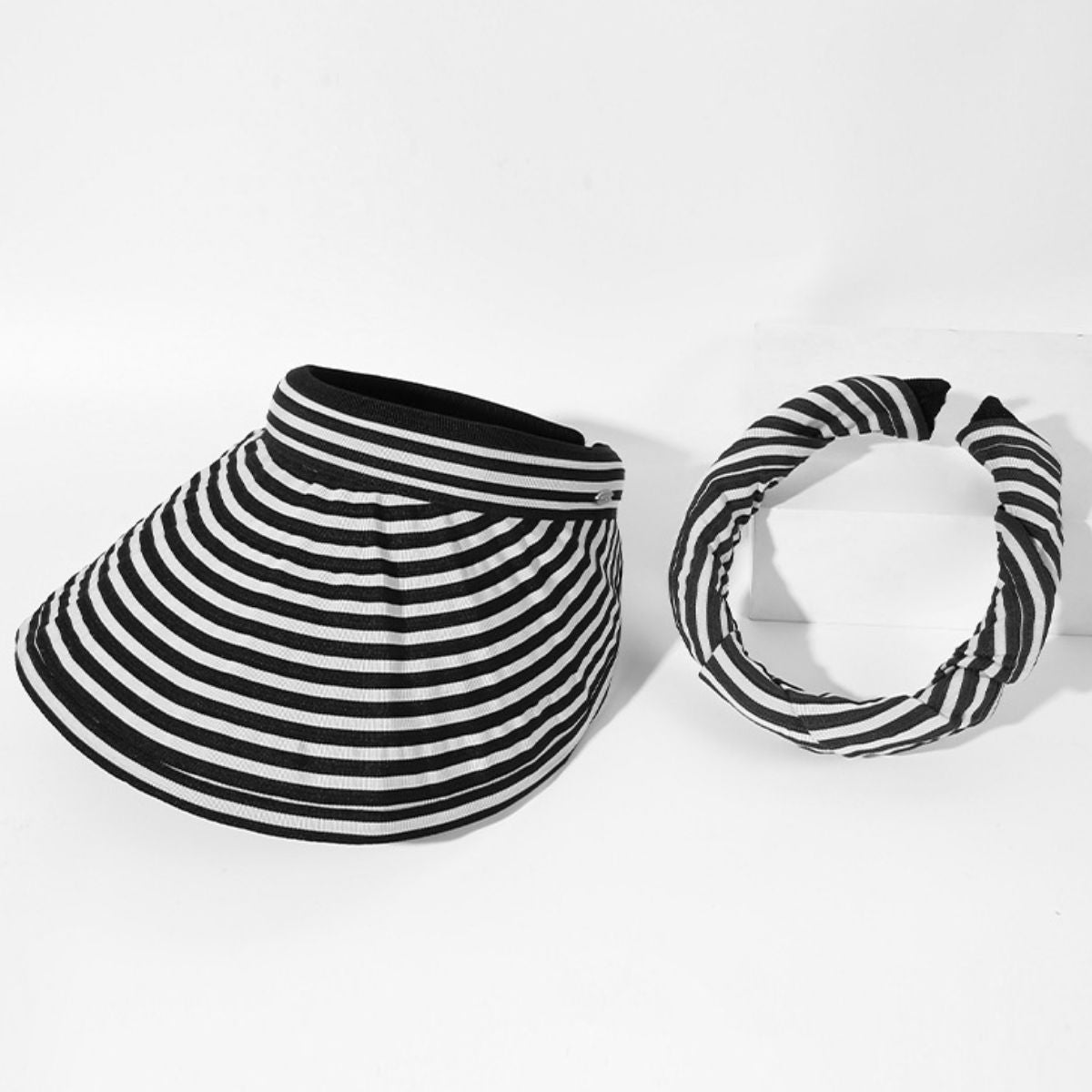 Women’s striped wide brim sun visor hat by Plush Fashion Hub, breathable summer beach accessory with stylish design.