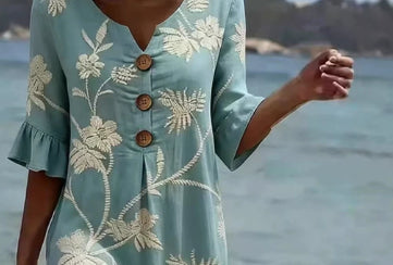 Women's casual FitiqueFit resort V-neck dress with coconut print, loose fit and three-quarter sleeves, perfect for warm weather.