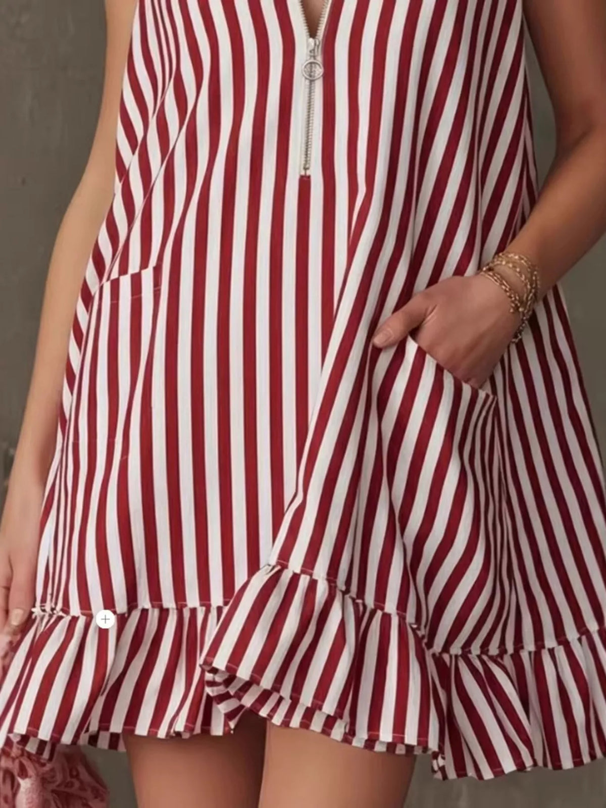 Striped zipper neck ruffle hem dress by Plush Fashion Hub, featuring a stylish design with a zipper neckline and ruffled hem.