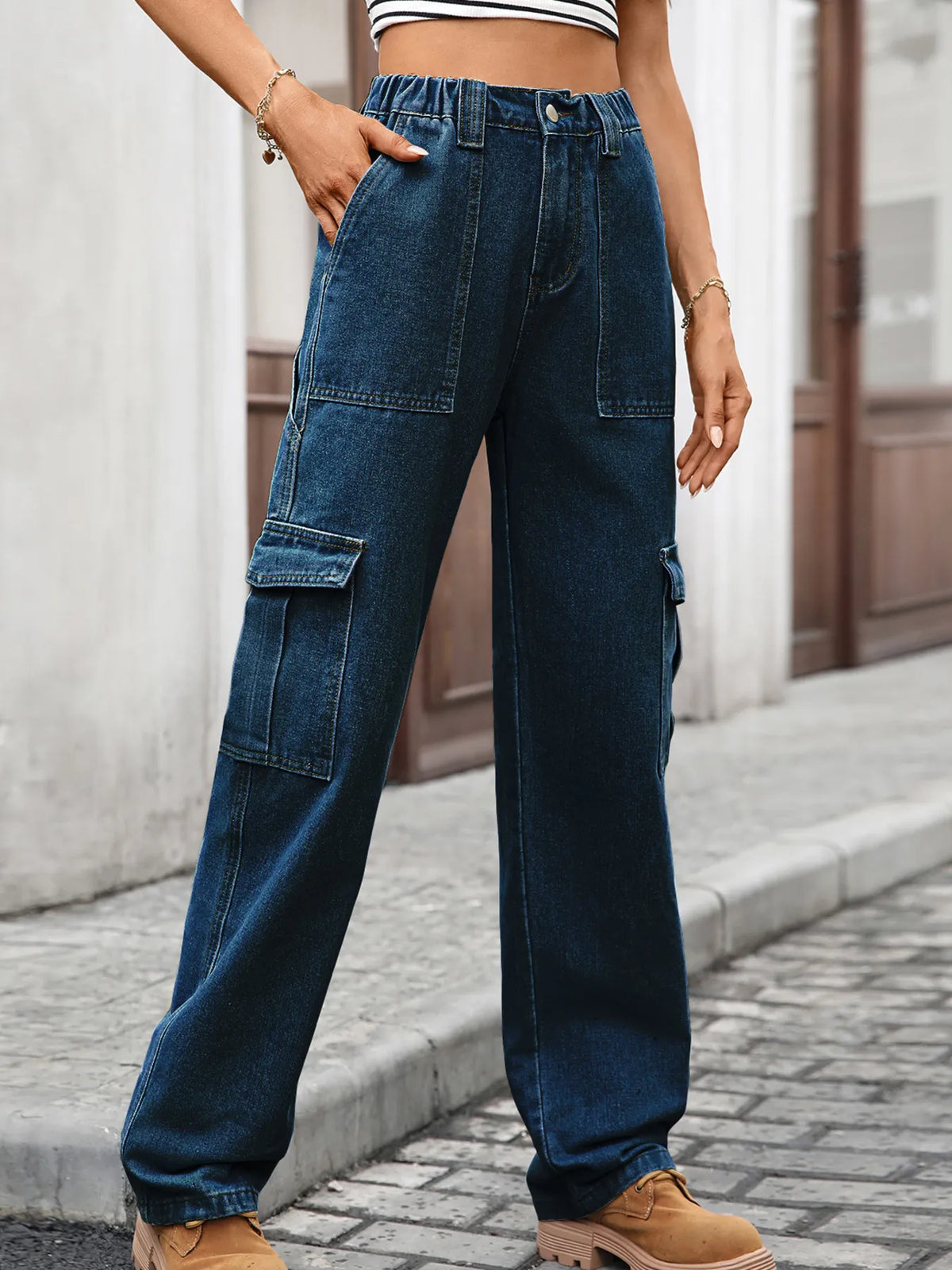 High-waisted cargo denim jeans from Plush Fashion Hub, showcasing classic blue denim with functional pockets and a relaxed fit.