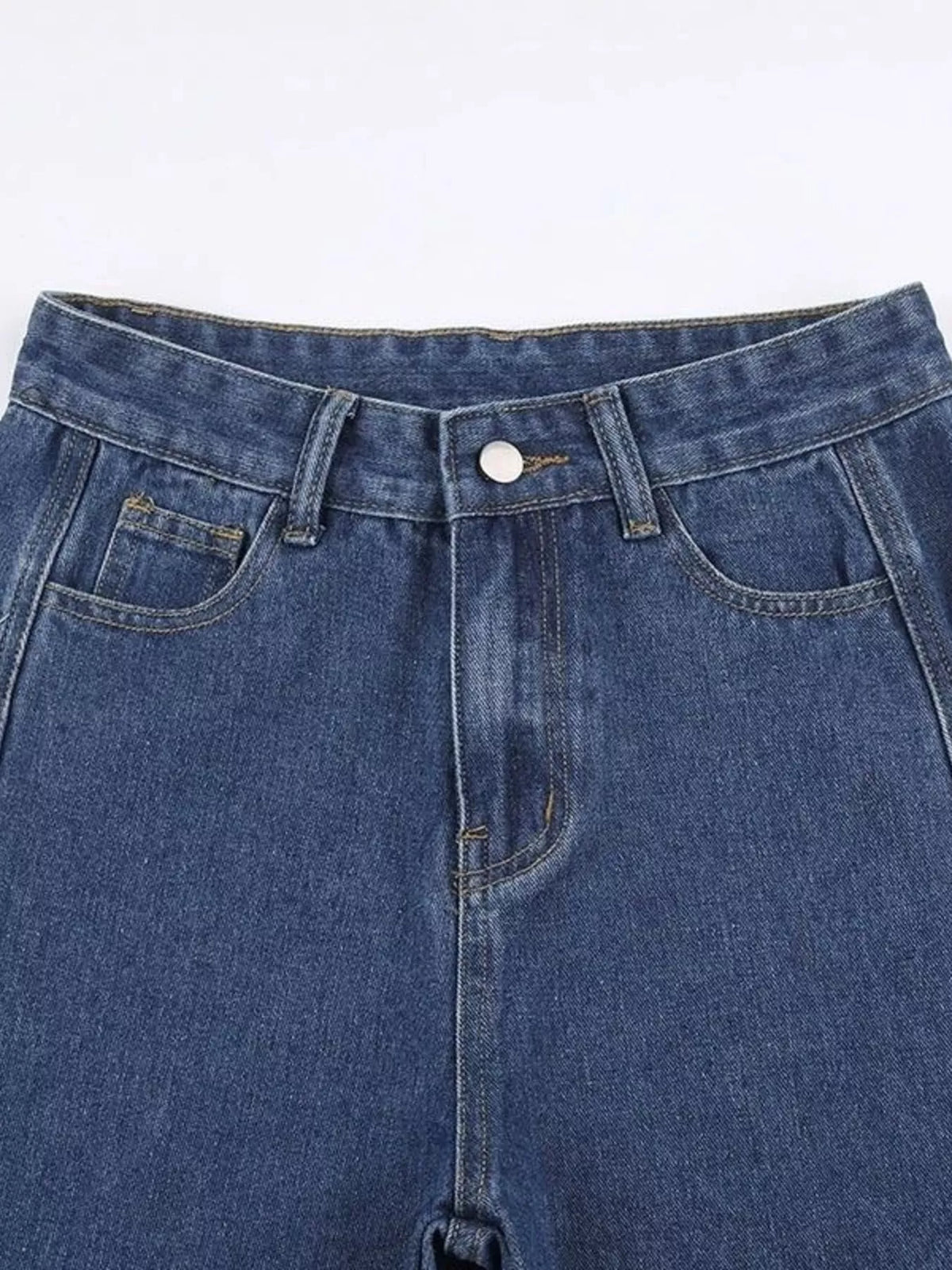 Light blue Plush Fashion Hub side distressed denim jeans with ripped details and frayed hems, casual and stylish for everyday wear.