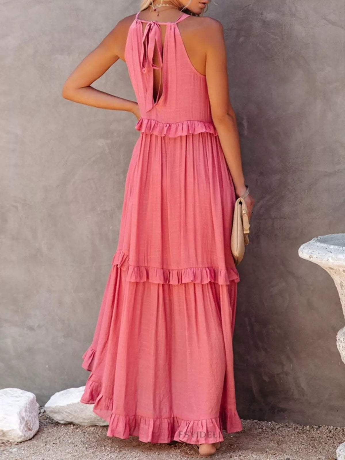 Plush Fashion Hub ruffled tiered sleeveless maxi dress with flowing fabric and layered design, perfect for summer occasions.