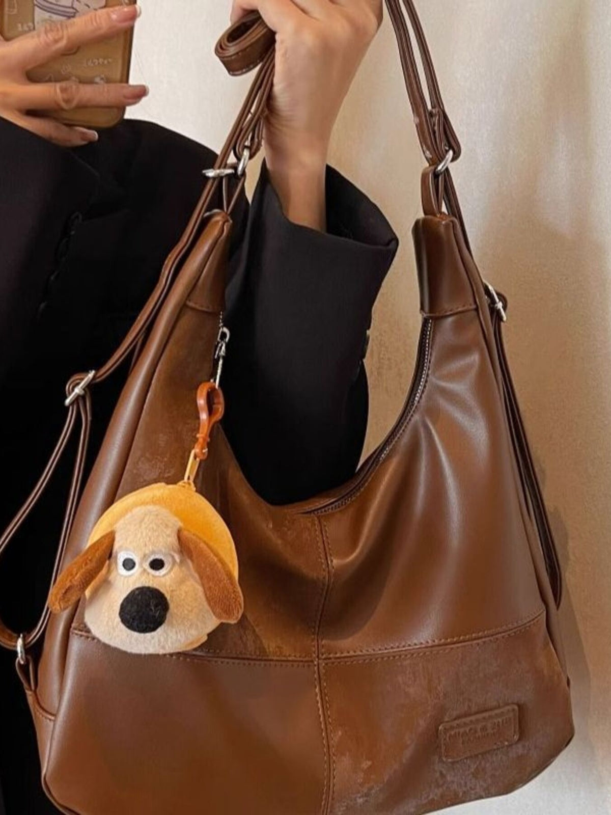 Vintage-inspired plush fashion hub PU leather slouchy hobo shoulder bag with spacious design and stylish details.