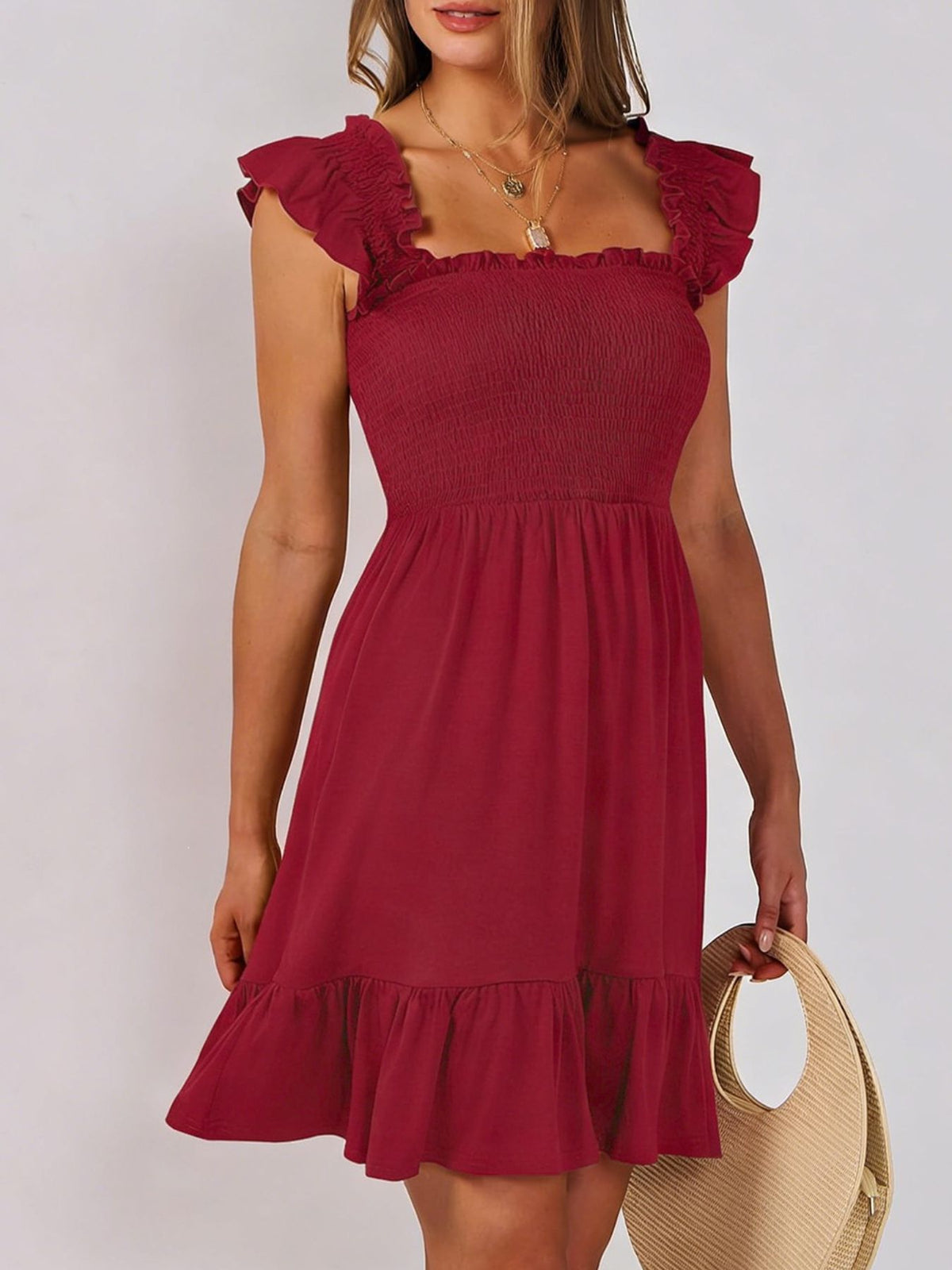 Women's lightweight summer dress by Plush Fashion Hub featuring a smocked bodice, ruffle hem, and casual mini design.