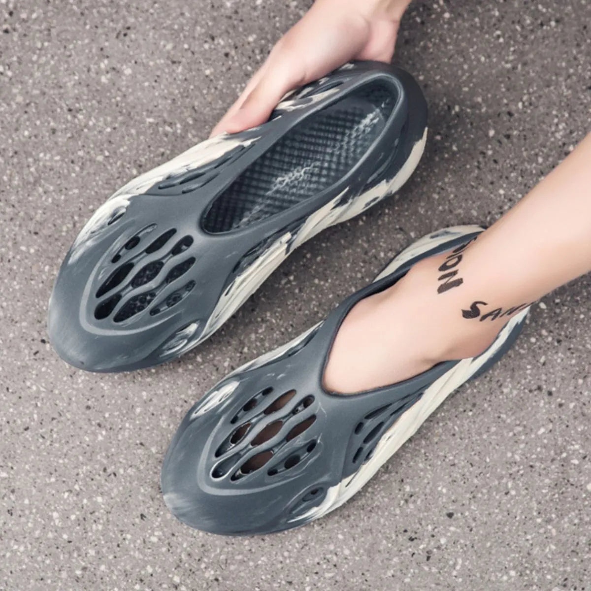 Plush Fashion Hub hollow-out flat sandals showing open toe design and stylish cut-out details on beige footwear.