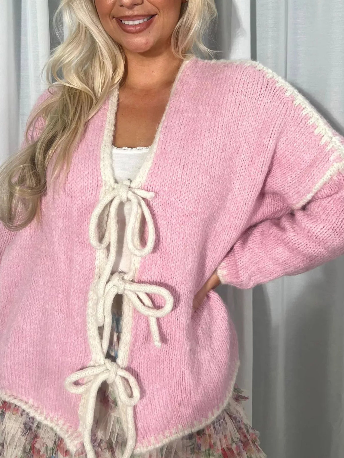 Tie front drop shoulder cardigan by Trendsi, featuring a relaxed fit with a tie-front closure and soft knit fabric.