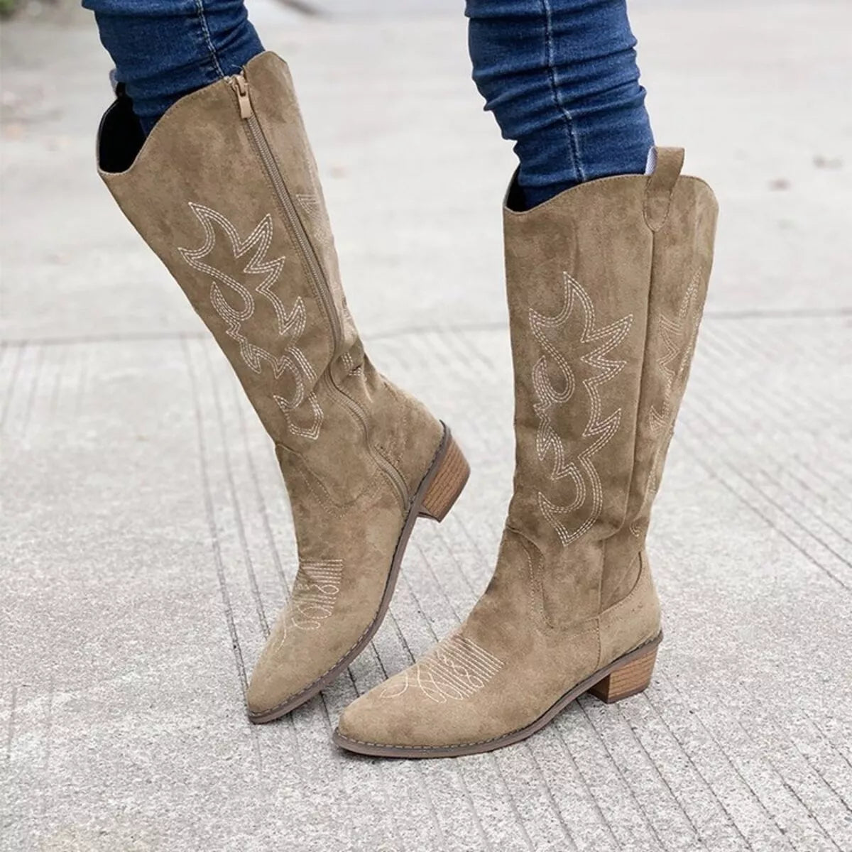 Point toe block heel boots by Trendsi, stylish footwear with a sleek design, featuring pointed toes and chunky heels.