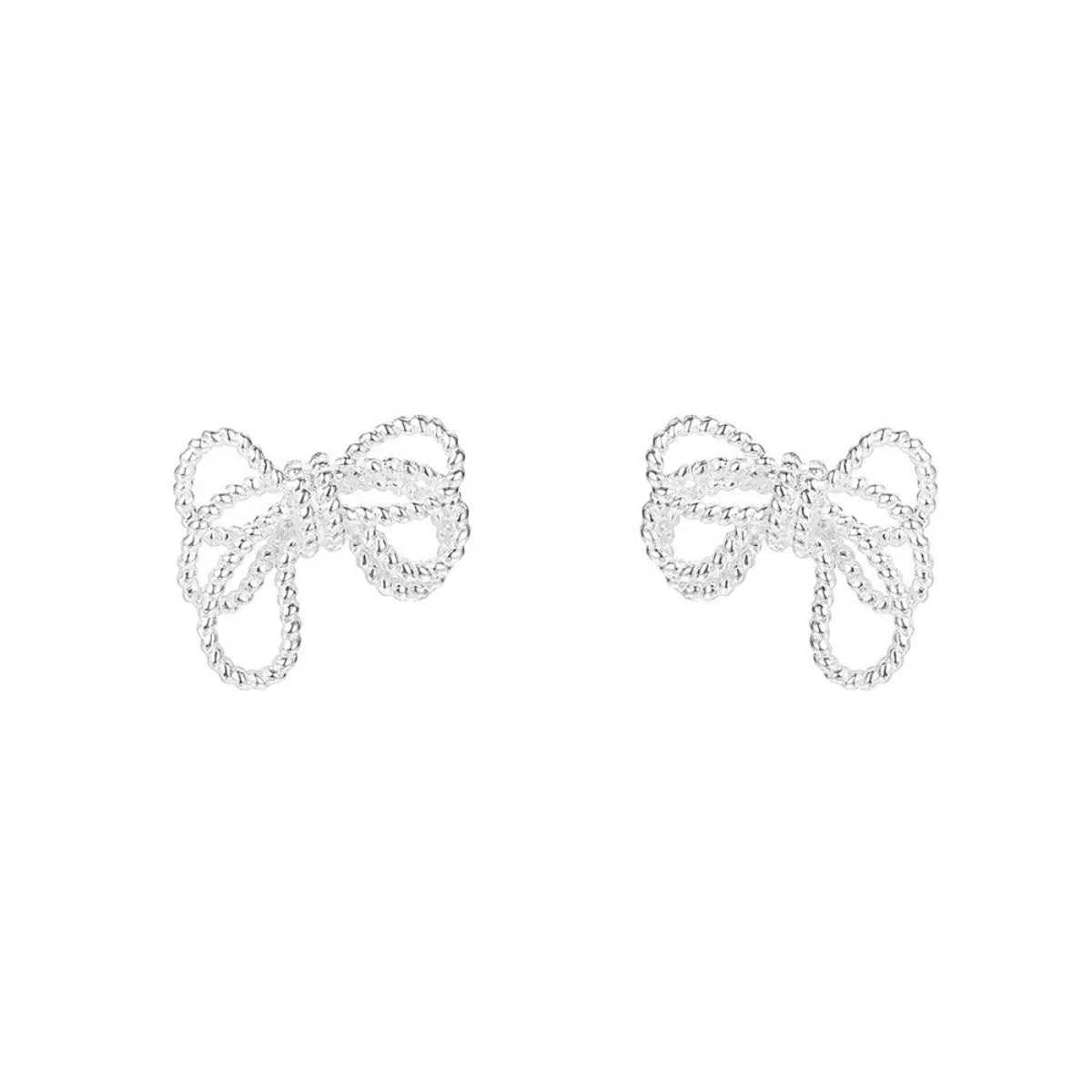 Sterling silver bow knot stud earrings with polished finish, designed for a subtle, elegant look.