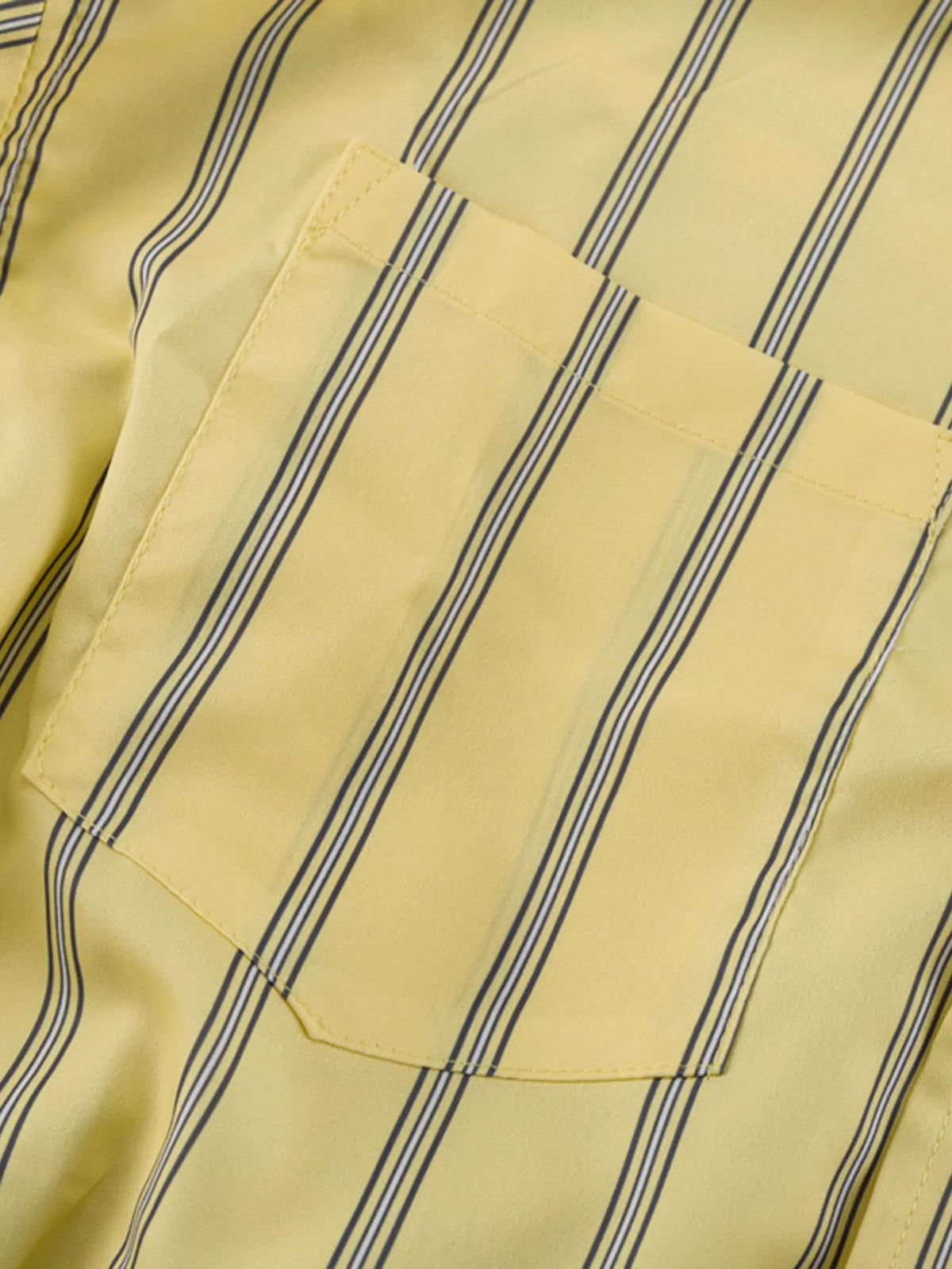 Striped button-up shirt and shorts loungewear set from Plush Fashion Hub, casual and comfortable for relaxed wear.