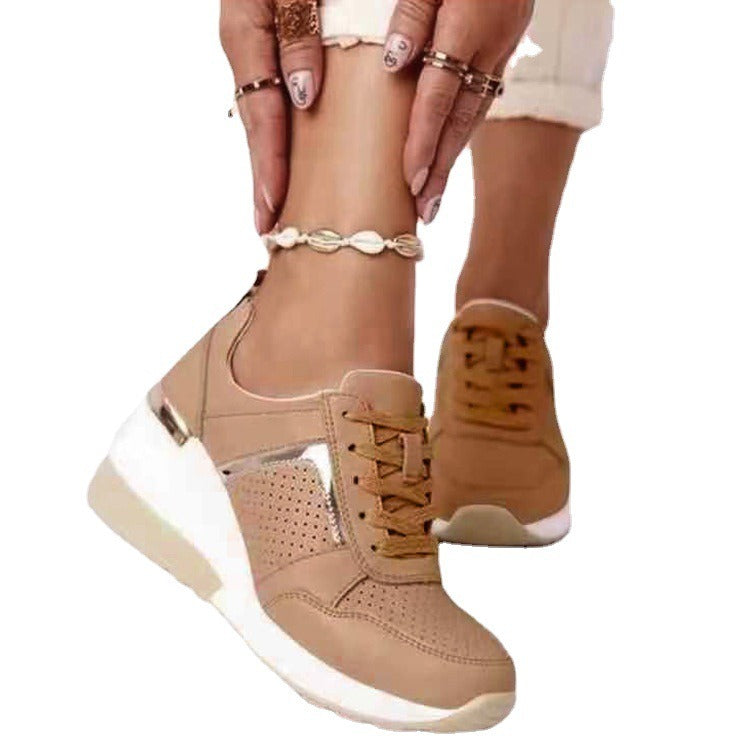 Beige lace-up platform sneakers with perforated mesh details, metallic silver accents, and a thick white sole.