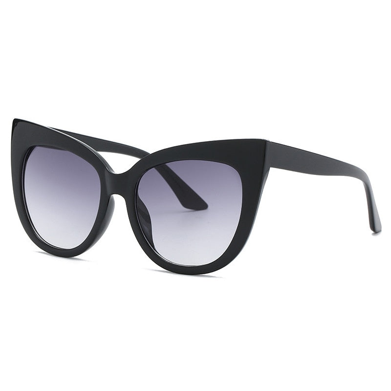 Women's oversized cat eye sunglasses with UV400 protection, stylish eyewear by Plush Fashion Hub featuring bold, fashionable design.