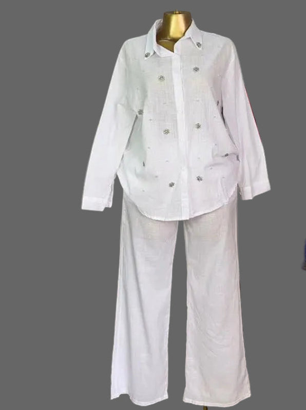 Beaded long sleeve top and high-waist pants set by eprolo, stylish with intricate bead details and fitted design.