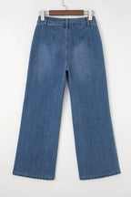 Aleah waist wide-leg jeans by Threaded Pear featuring a high-rise fit and classic denim wash, shown on a model.