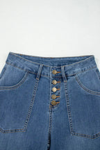Light blue Aleah waist-wide leg jeans by Threaded Pear displayed on a model, showcasing relaxed fit and trendy style.