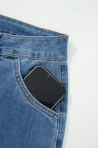 Aleah waist-wide leg jeans by Threaded Pear featuring a high waist and relaxed fit, shown on a model against a neutral background.