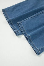 Light blue Aleah waist-wide leg jeans by Threaded Pear, featuring a high waist and relaxed fit, displayed on a model.