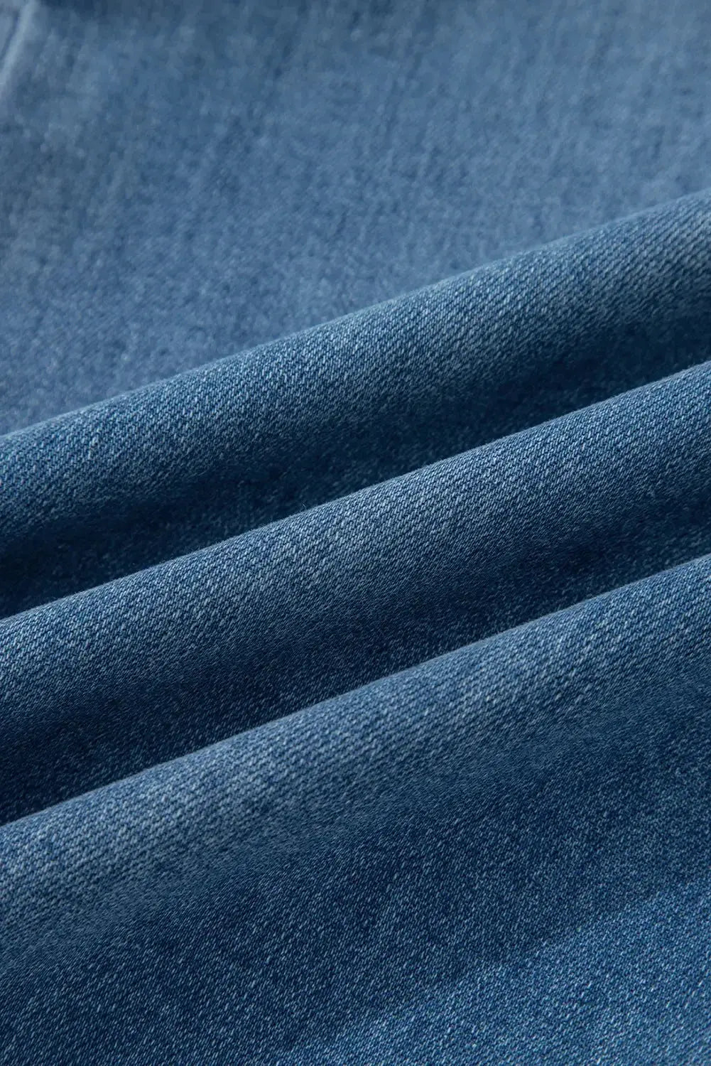 Aleah waistwide leg jeans by Threaded Pear, featuring a high-rise fit and relaxed wide-leg style, shown in a casual denim look.