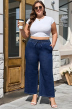 Analeia wide-leg casual plus jeans by Threaded Pear, showing the relaxed fit and denim fabric in a natural pose