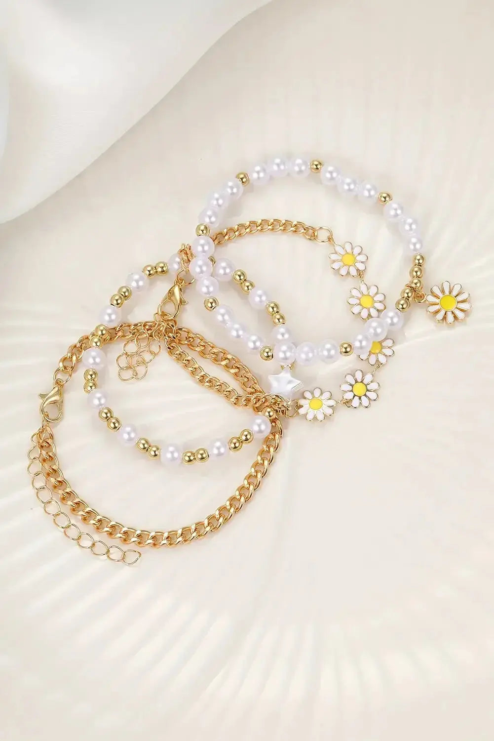 Beaded chain bracelet set by Threaded Pear featuring multiple stylish jewelry pieces with colorful beads and delicate design.