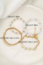 April beaded chain bracelet set by Threaded Pear featuring multiple delicate beaded jewelry pieces on a neutral background.
