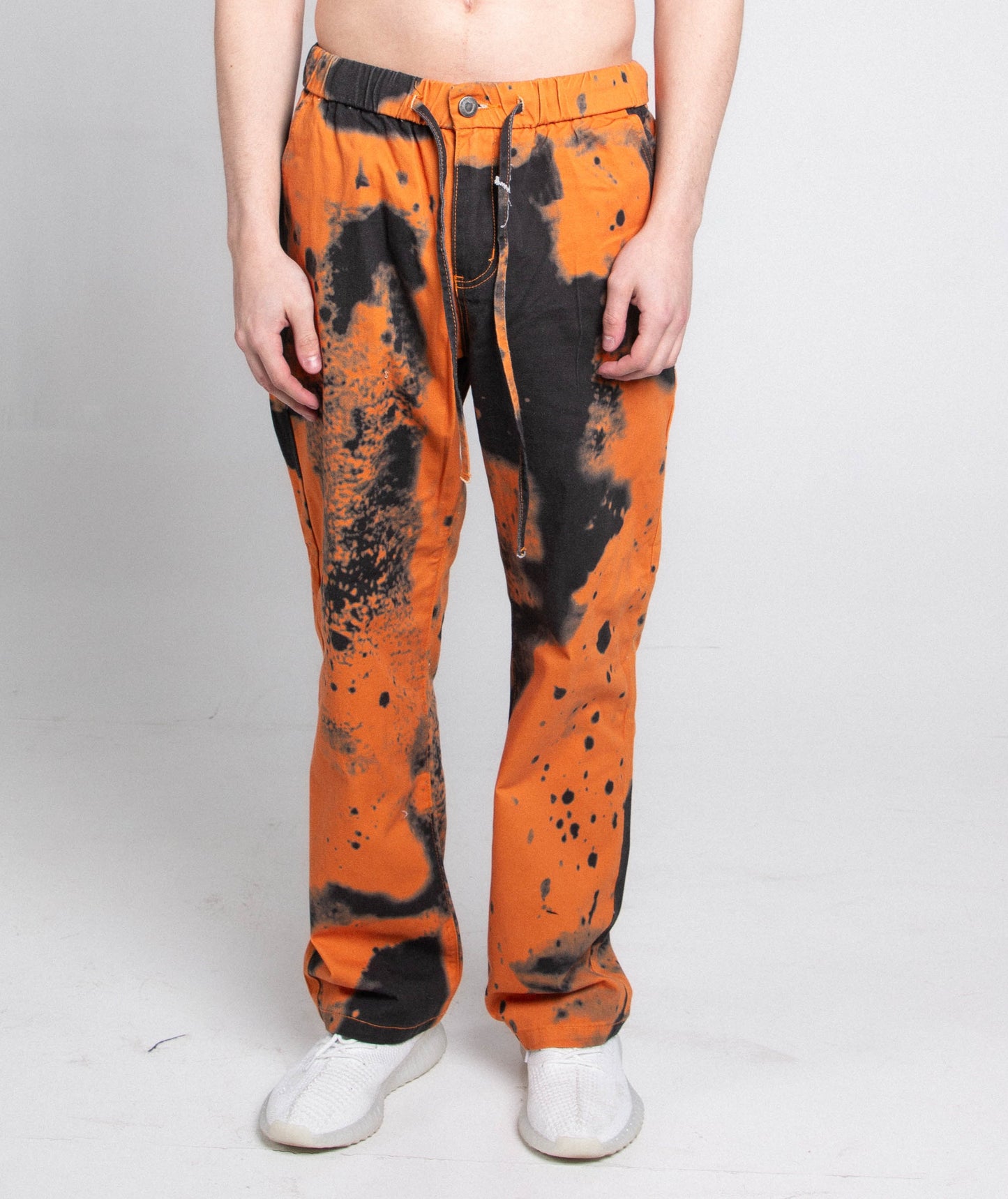 Loose color dye jeans pants by Plush Fashion Hub with a relaxed fit and vibrant, artistic color splashes.