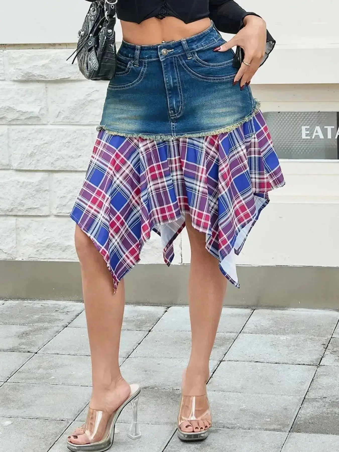 Asymmetric plaid hem denim skirt with functional pockets by Trendsi, styled with casual and trendy details.
