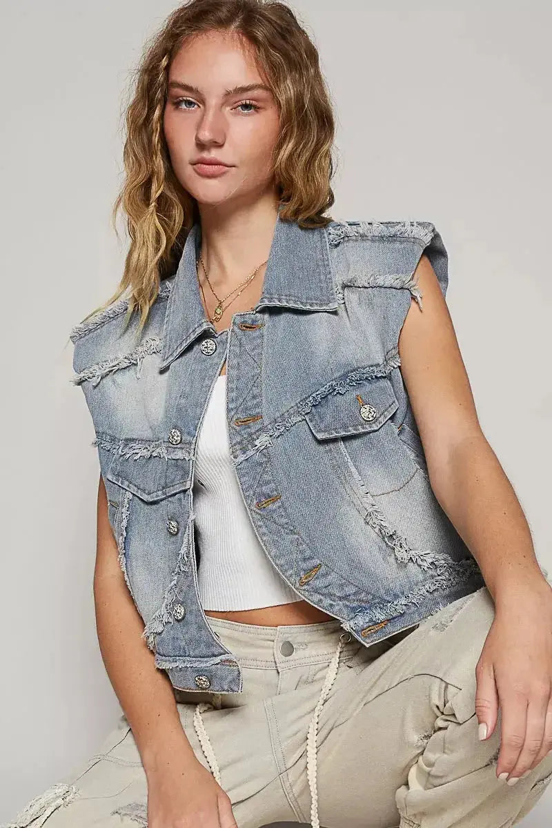 Asymmetrical distressed denim vest with raw hem, sleeveless jean jacket by Plush Fashion Hub, trendy casual outerwear.