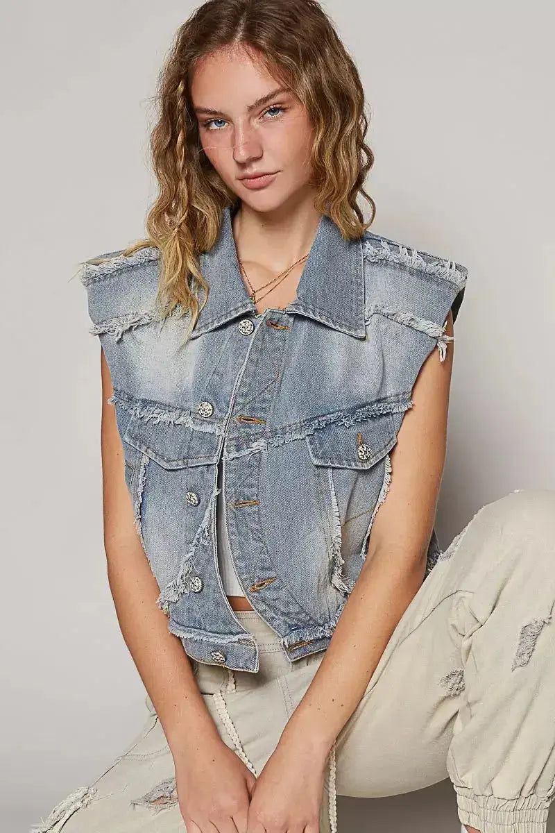 Distressed asymmetrical denim vest with raw hem from Plush Fashion Hub, sleeveless jean jacket, trendy casual outerwear.