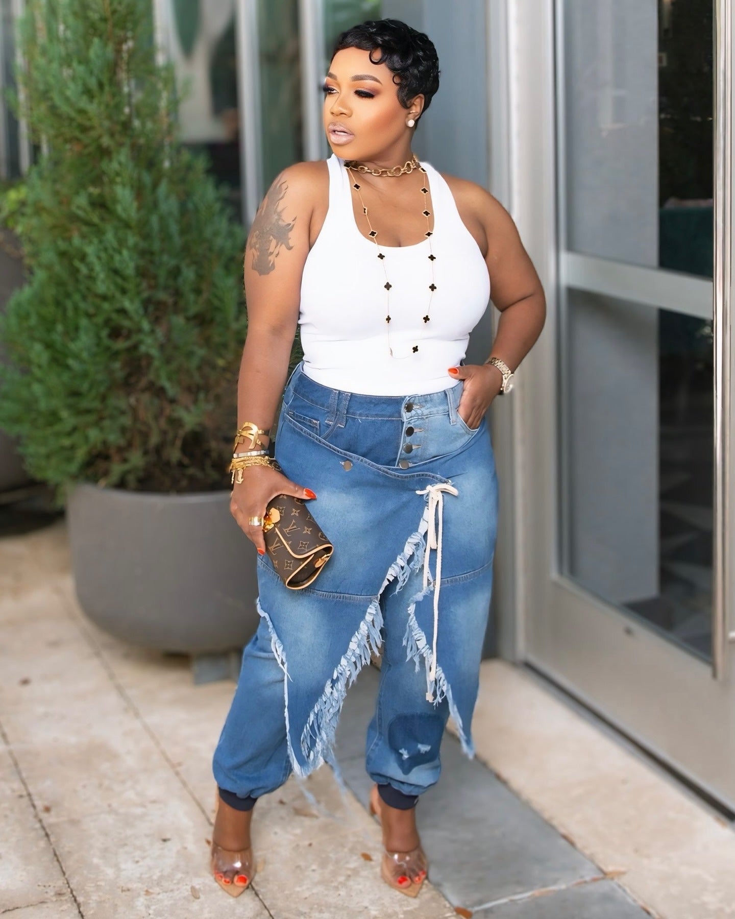 Ripped ribbed tie-waist slim fit jeans by Plush Fashion Hub, showcasing distressed details and a flattering slim silhouette.
