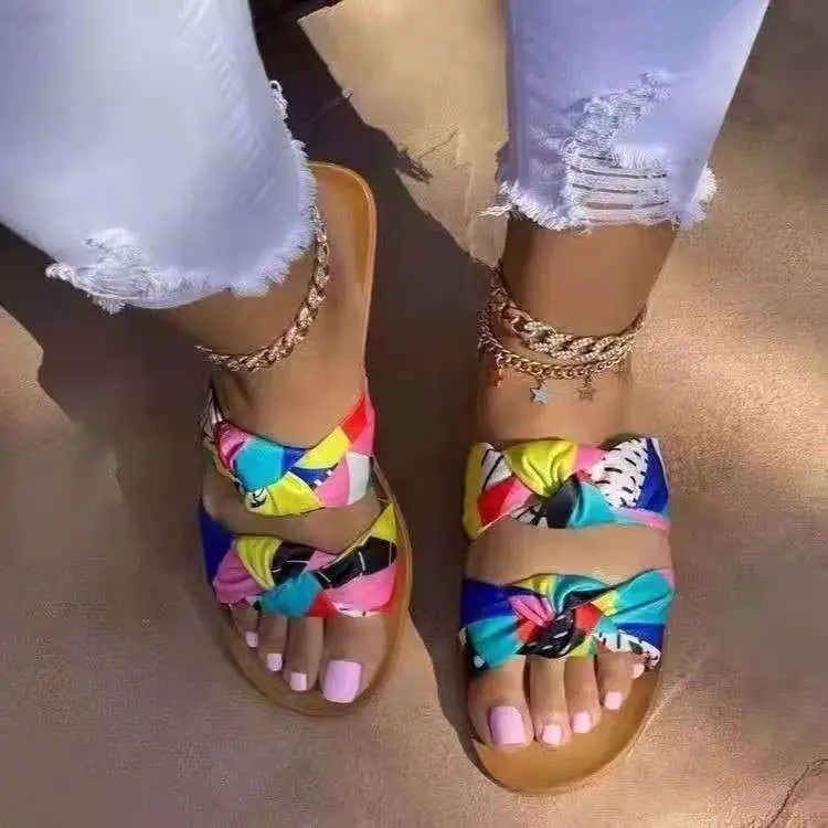 Women's bowknot toe flat sandals by Trendy Attic Store01 featuring stylish design and comfortable flat sole, perfect for casual wear.