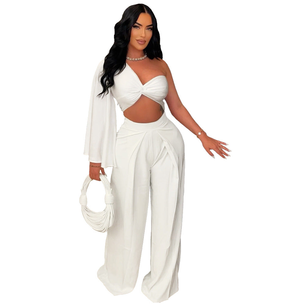 Asymmetrical pleated one-shoulder top and matching trousers from Plush Fashion Hub, stylish women's fashion set.