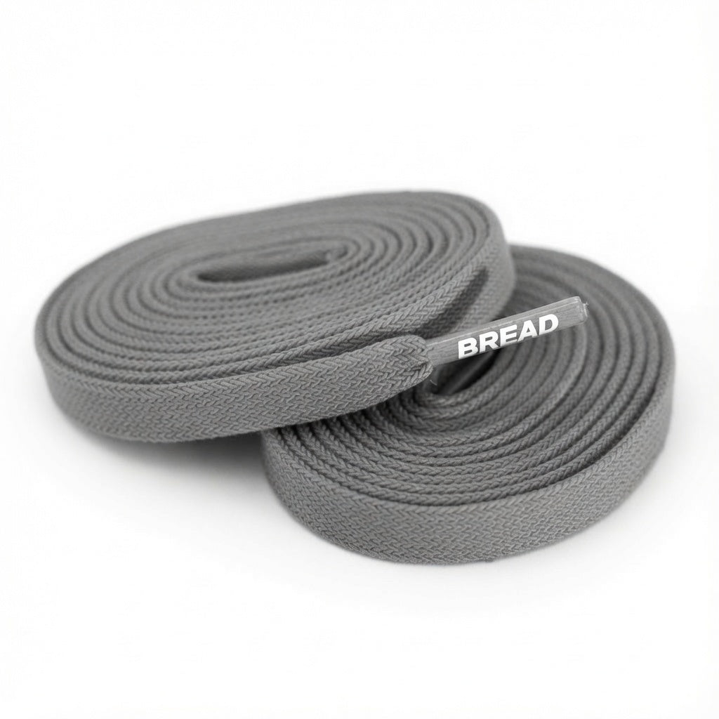 Gray elastic shoelace by Bread, Vulture Gray color, featuring stretchable design and secure fit for sneakers or casual shoes.