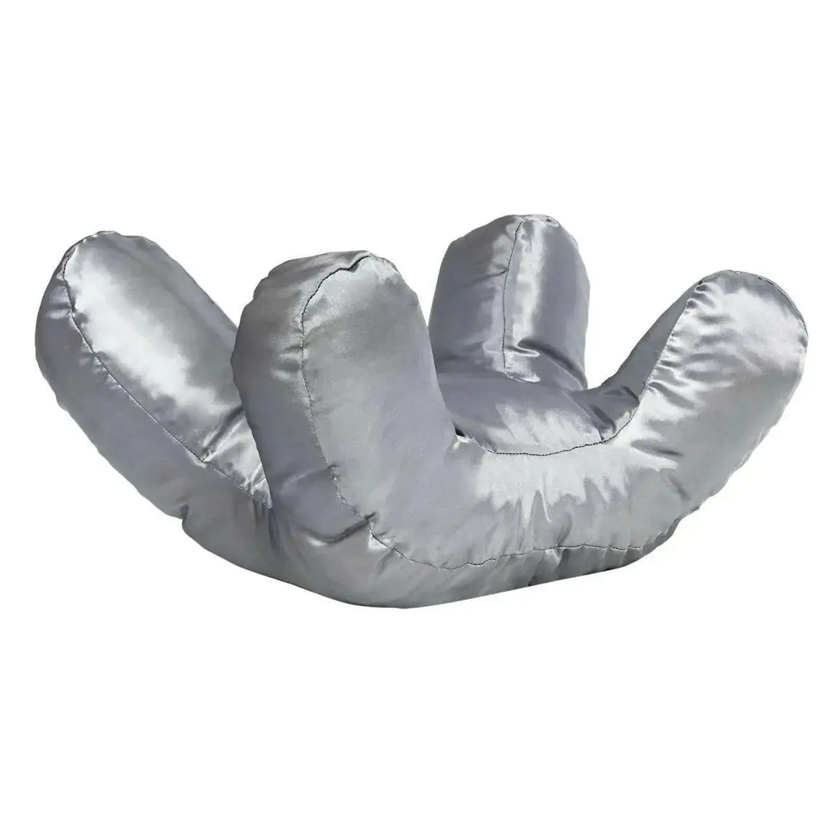 Plush Fashion Hub anti-wrinkle ergonomic beauty sleep support pillow resting on a bed, designed for facial wrinkle prevention and comfort.