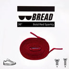 Elastic shoelace in bold red color by Bread, shown laced through shoe eyelets for a secure, stylish fit.