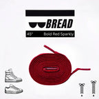 Red elastic shoelace by Bread, shown coiled with flexible stretch and vibrant color for easy, secure footwear fastening.