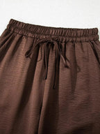 Trendsi braided V-neck long sleeve top and high-waist pants lounge set, comfortable casual wear, stylish matching outfit.
