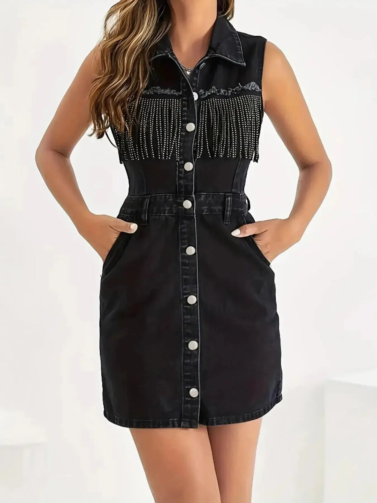 Plush Fashion Hub denim mini dress with button-front closure and fringe detail, styled for casual or trendy occasions.