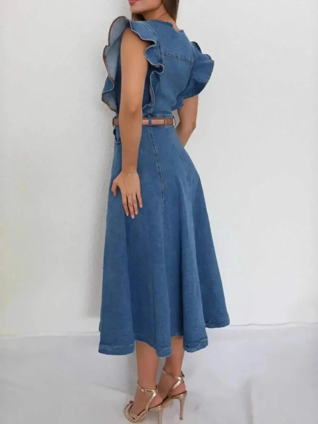 Denim midi dress with button front, ruffle sleeves, and tie belt by Trendsi, displayed on a hanger.